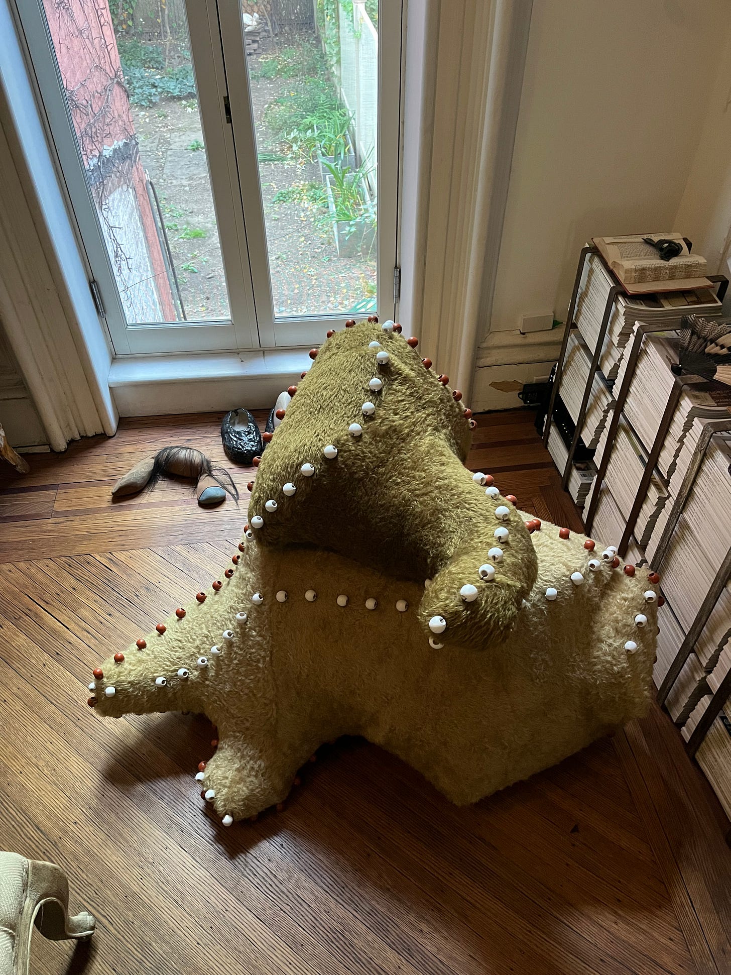 A mohair sculpture in an undulating shape.