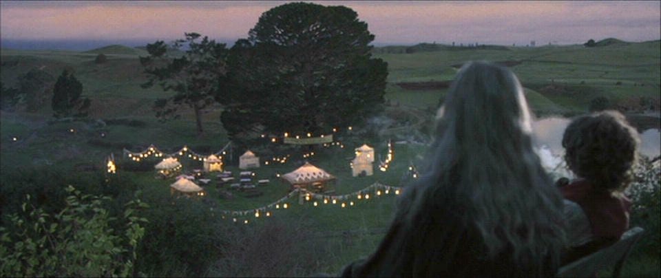Bilbo and Gandalf looking at the Party Tree