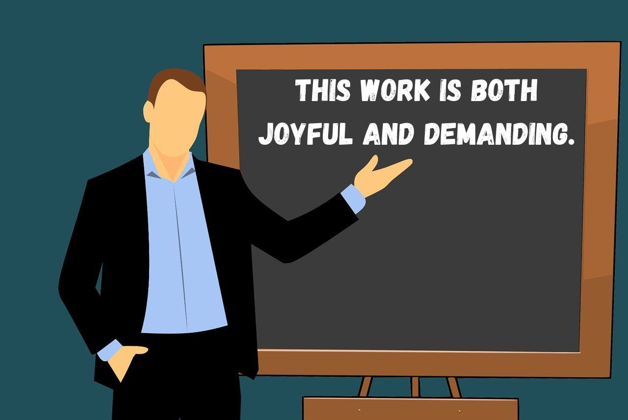 A cartoon image of a teacher at a blackboard with the text "the work is both joyful and demanding" written on it.