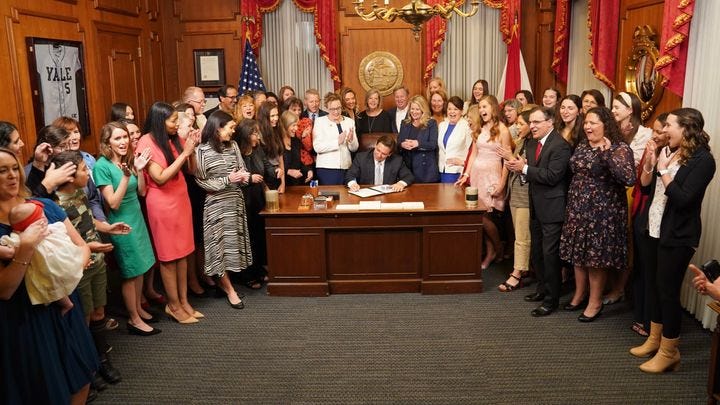Florida Gov. Ron DeSantis signs the "Heartbeat Protection Bill," banning abortion after six weeks. The ceremony took place just before 11 p.m. on April 13, without prior announcement or extended remarks before media.