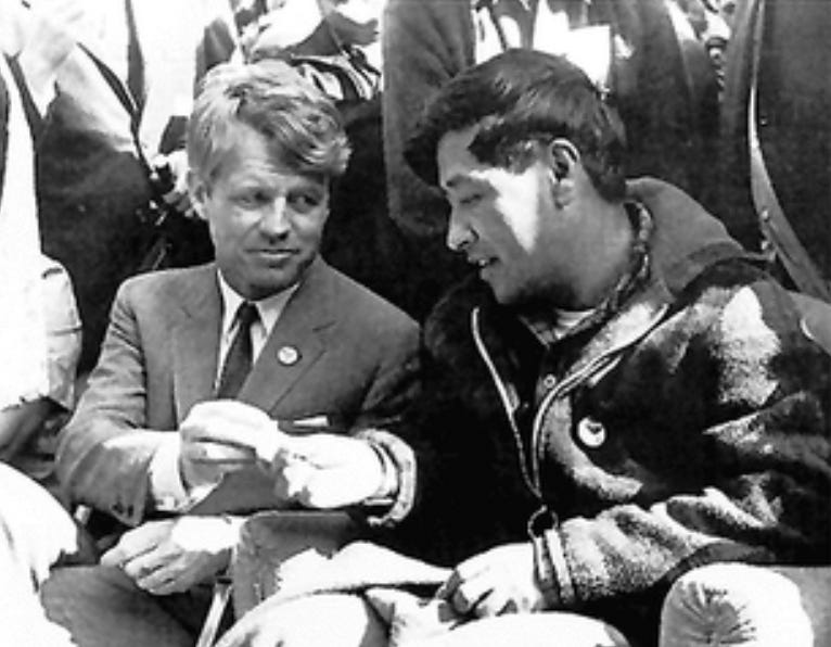 RFK and Cesar Chavez break bread on March 10, 1968.