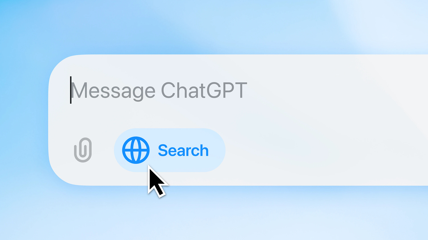 Close-up of a search bar with the text ‘Message ChatGPT’ and a blinking text entry cursor. Below, a globe icon with ‘Search’ is shown, and a cursor hovers over the search button. A paperclip icon is also visible.