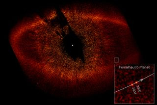 grainy red image looks like a giant eye. shows the Fomalhaut system.