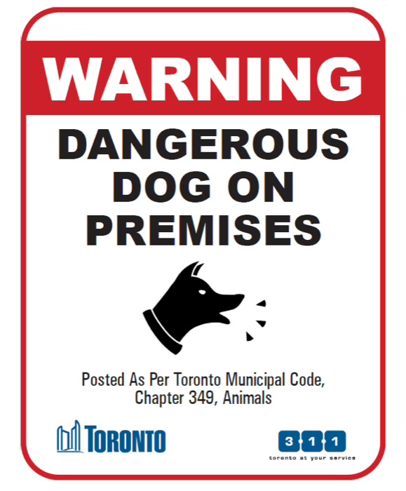 A sign reading WARNING Dangerous Dog on Premises