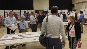 Hundreds of citizens attended a meeting this summer to review plans to widen Broadway Blvd.