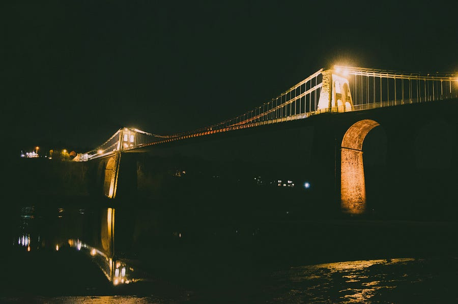 A lit bridge at night A lit bridge at night