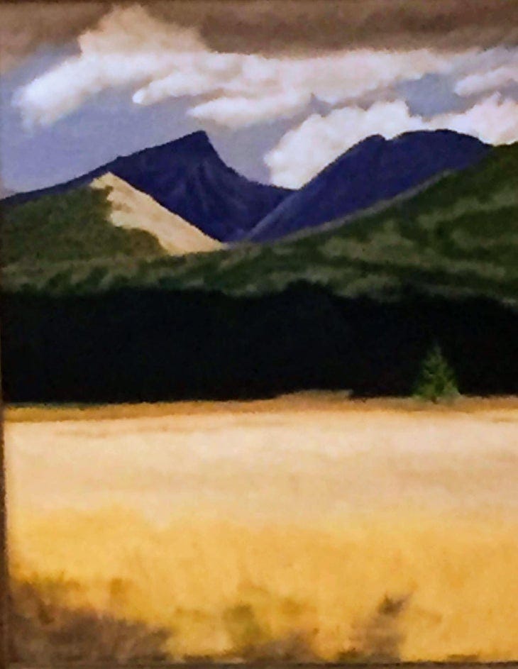 A painting of Mt. Ida with yellow grass in the foreground.