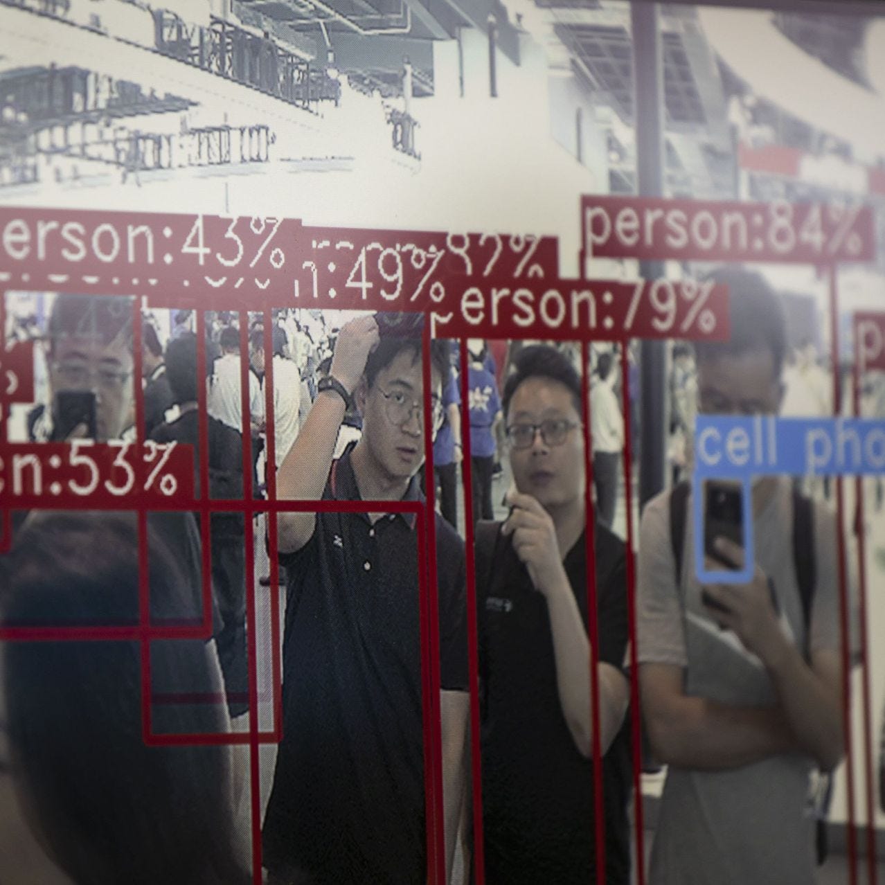 A facial recognition display at an AI Conference in Shanghai.