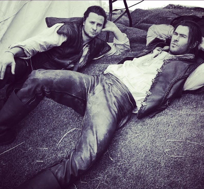 bobby holland laying with chris hemsworth thor on set avengers