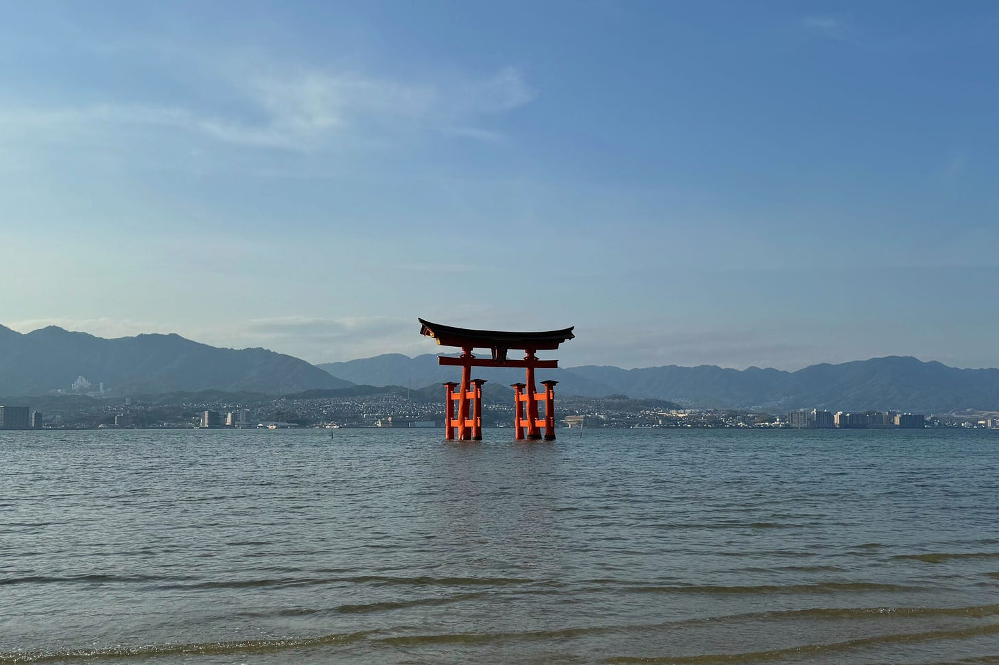 torii gate standing in the water - author's own photo