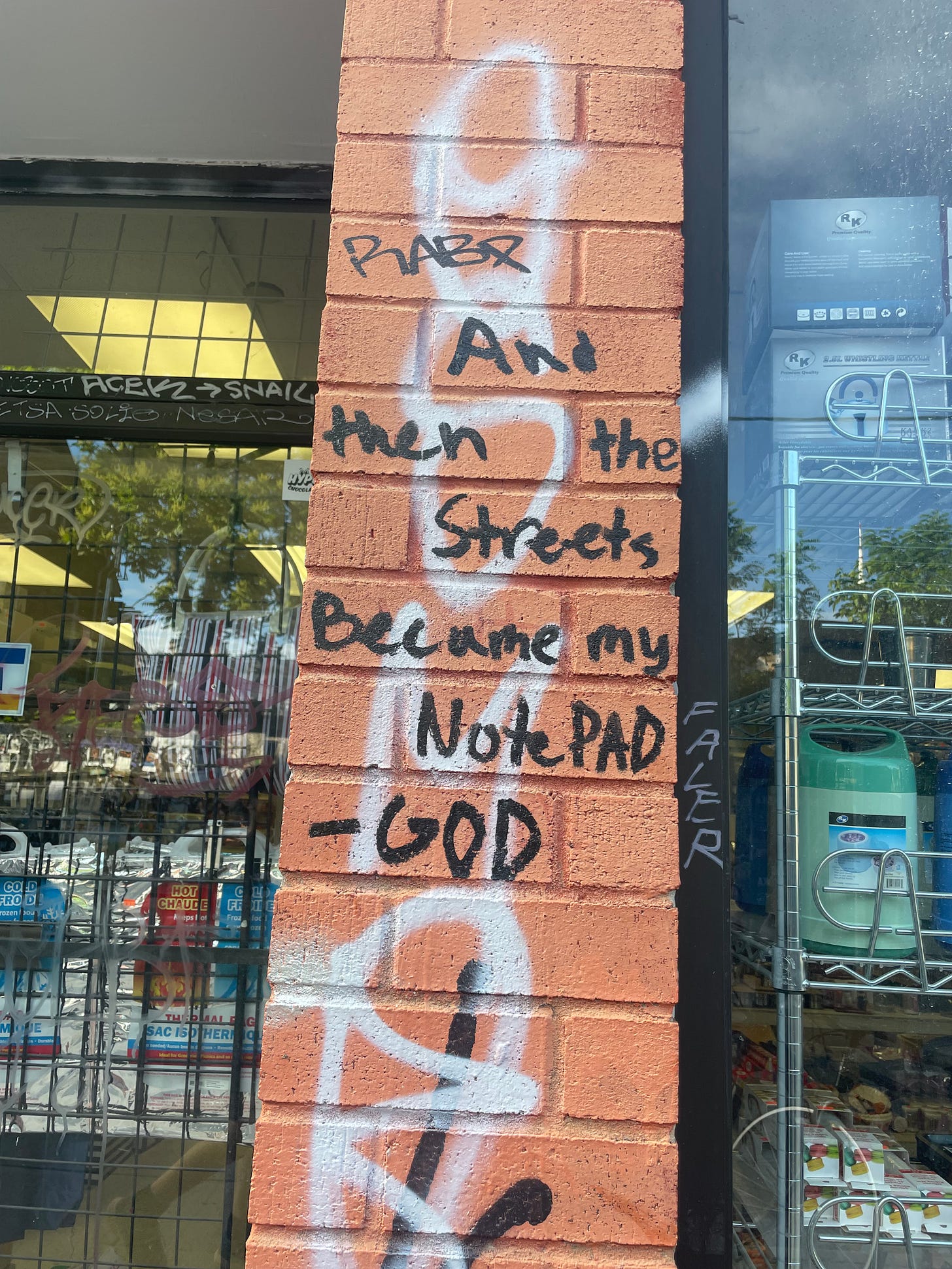 Graffiti on a wall states: And then the streets became my notepad. -God