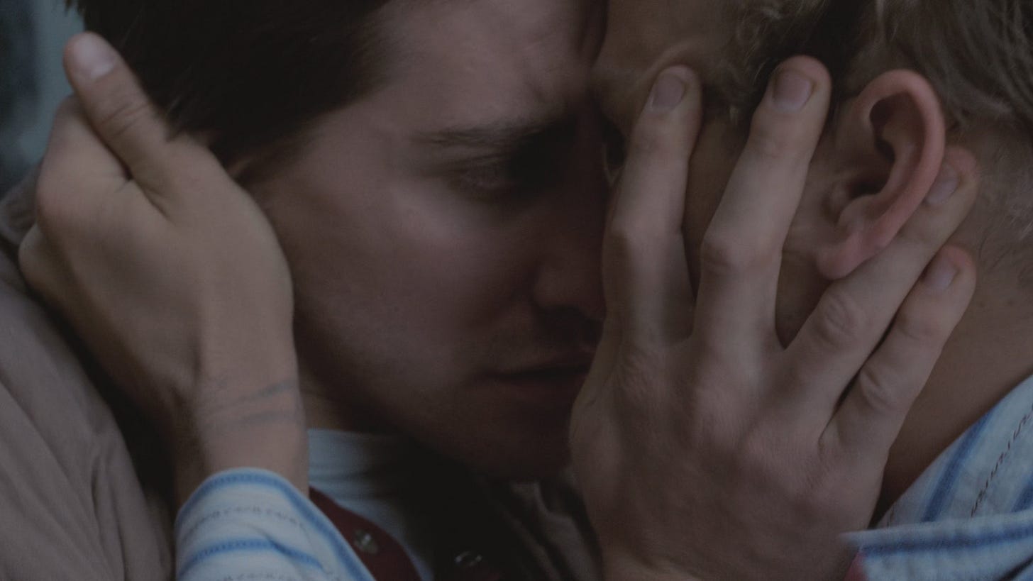 Brokeback Mountain | Still features Jake Gyllenhaal and Heath Ledger in a loving embrace.