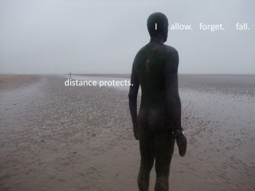 Antony Gormley’s Another Place installation with text