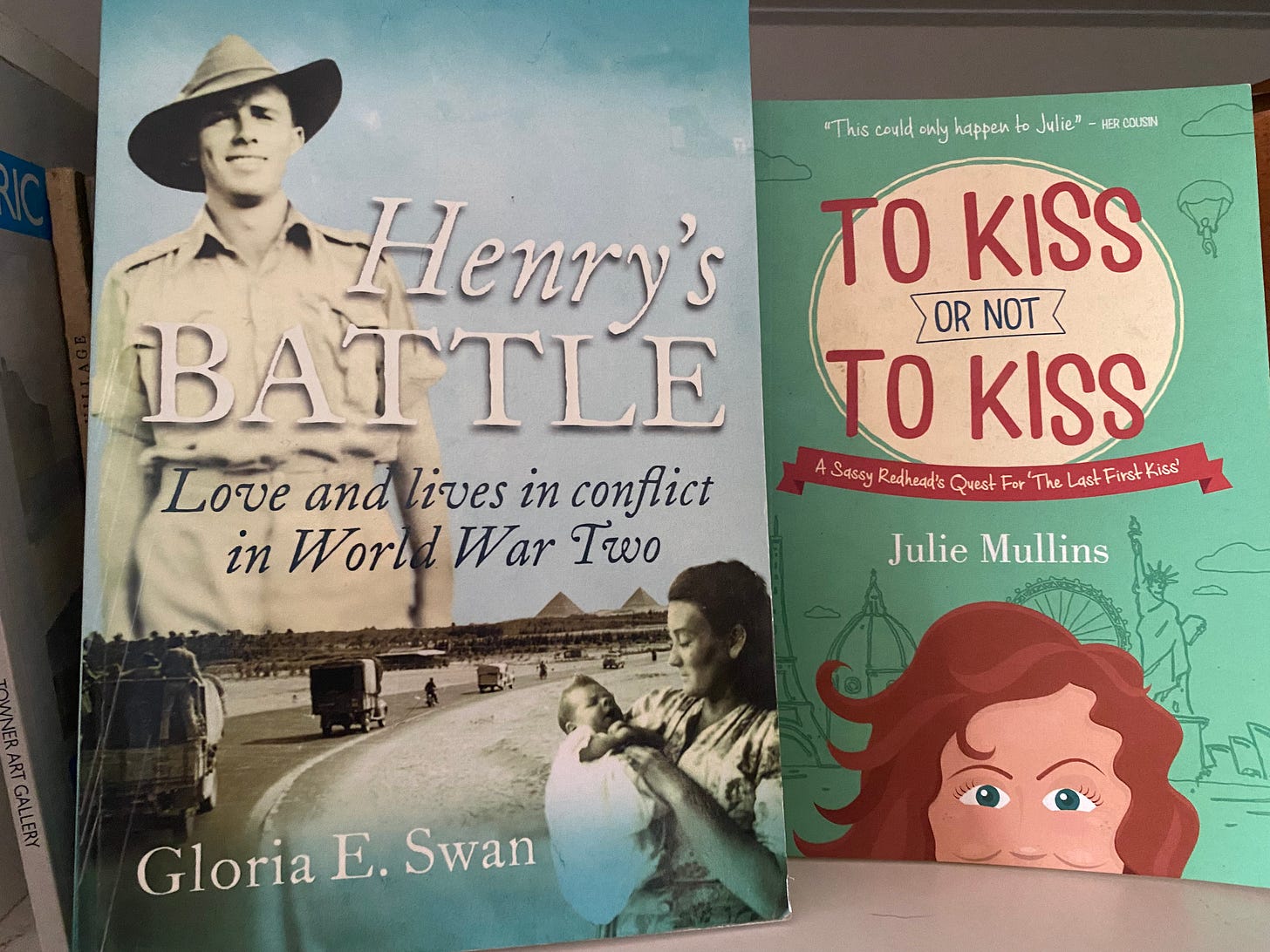 Images of two books, Henry's Battle by Gloria Swan and To Kiss Or Not To Kiss by Julie Mullins