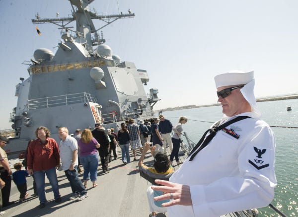 Rod Matthews reacts to the wind blowing up his uniform... Rod Matthews reacts to the wind blowing up his uniform...