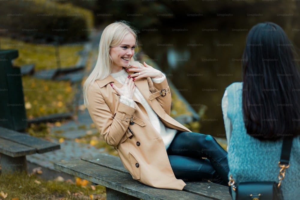 Two women having conversation in the park.