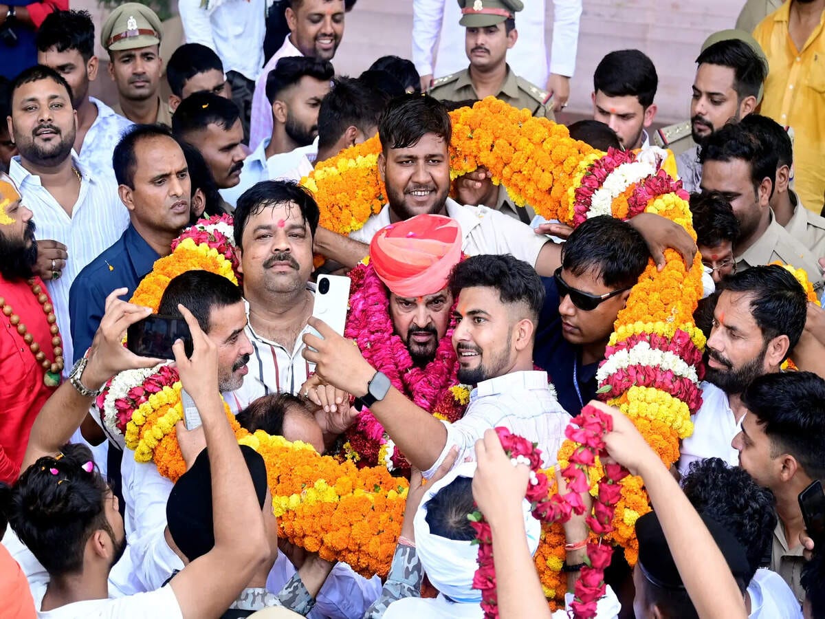 Brij Bhushan Sharan Singh holds 'victory parade' with 100 SUVs & 10,000 supporters after getting clean chit in POCSO case - The Economic Times Brij Bhushan Sharan Singh holds 'victory parade' with 100 SUVs & 10,000 supporters after getting clean chit in POCSO case - The Economic Times