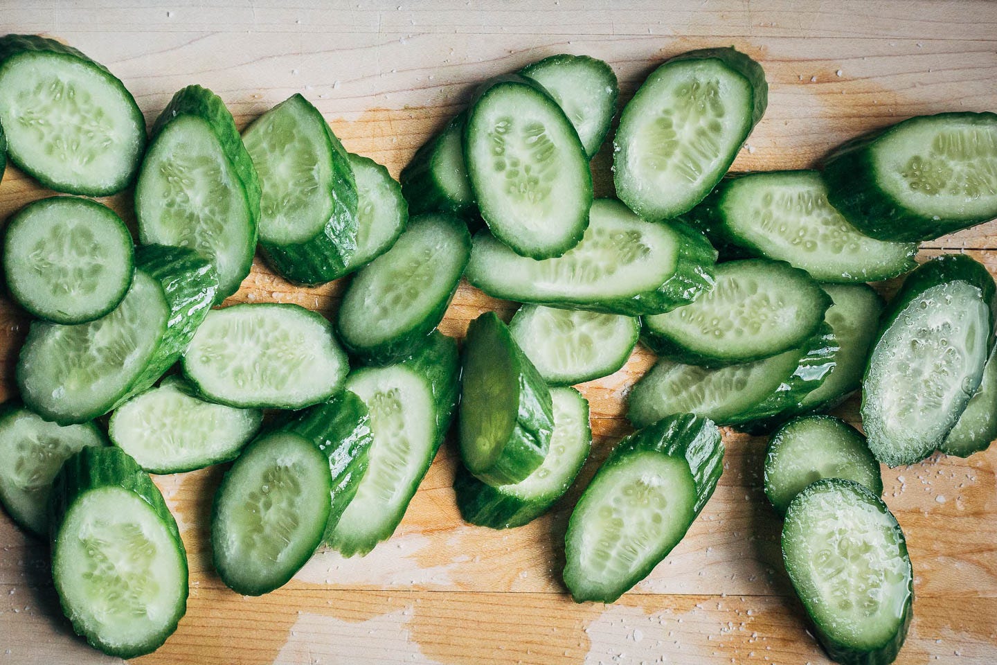 Sliced cucumbers on a cutting board