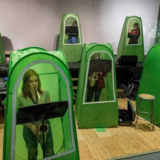 high school band practiced holed up in one man tents