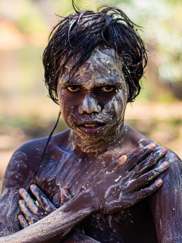And Sham Mangiru. Students are shown how to collect white clay for ceremony, corroboree and painting. Picture: Cody Thomas