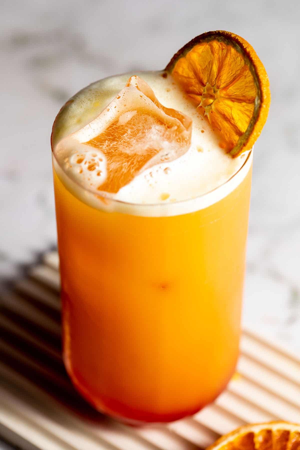 garibaldi on marble with slice of orange