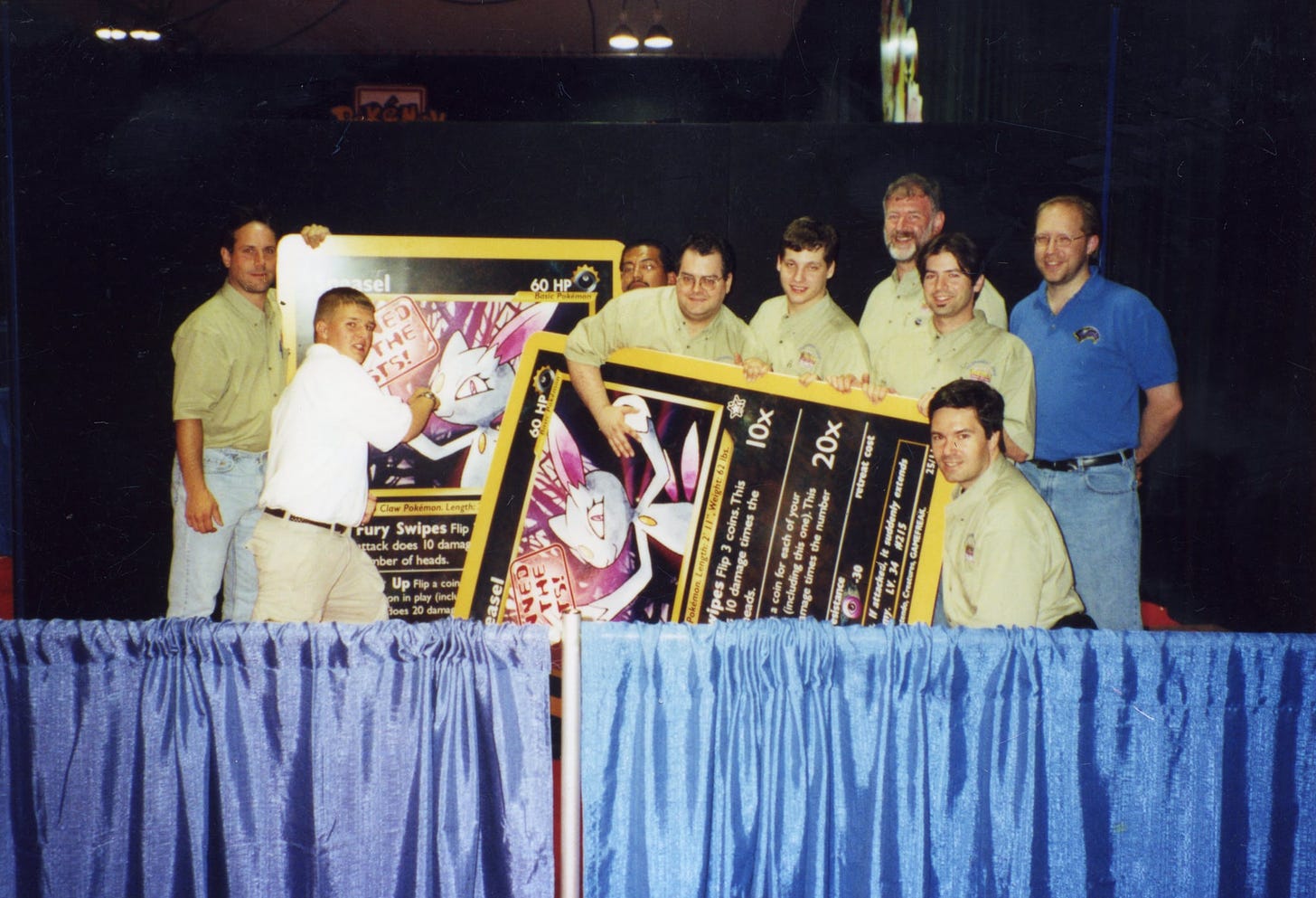 Team Compendium and WotC managers with "Banned" Sneasel cards at the 2001 East Coast Super Trainer Showdown