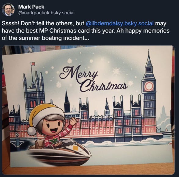 Daisy Cooper Christmas card, showing her on a boat outside the Houses of Parliament