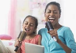 Image result for mom dad and children singing happy