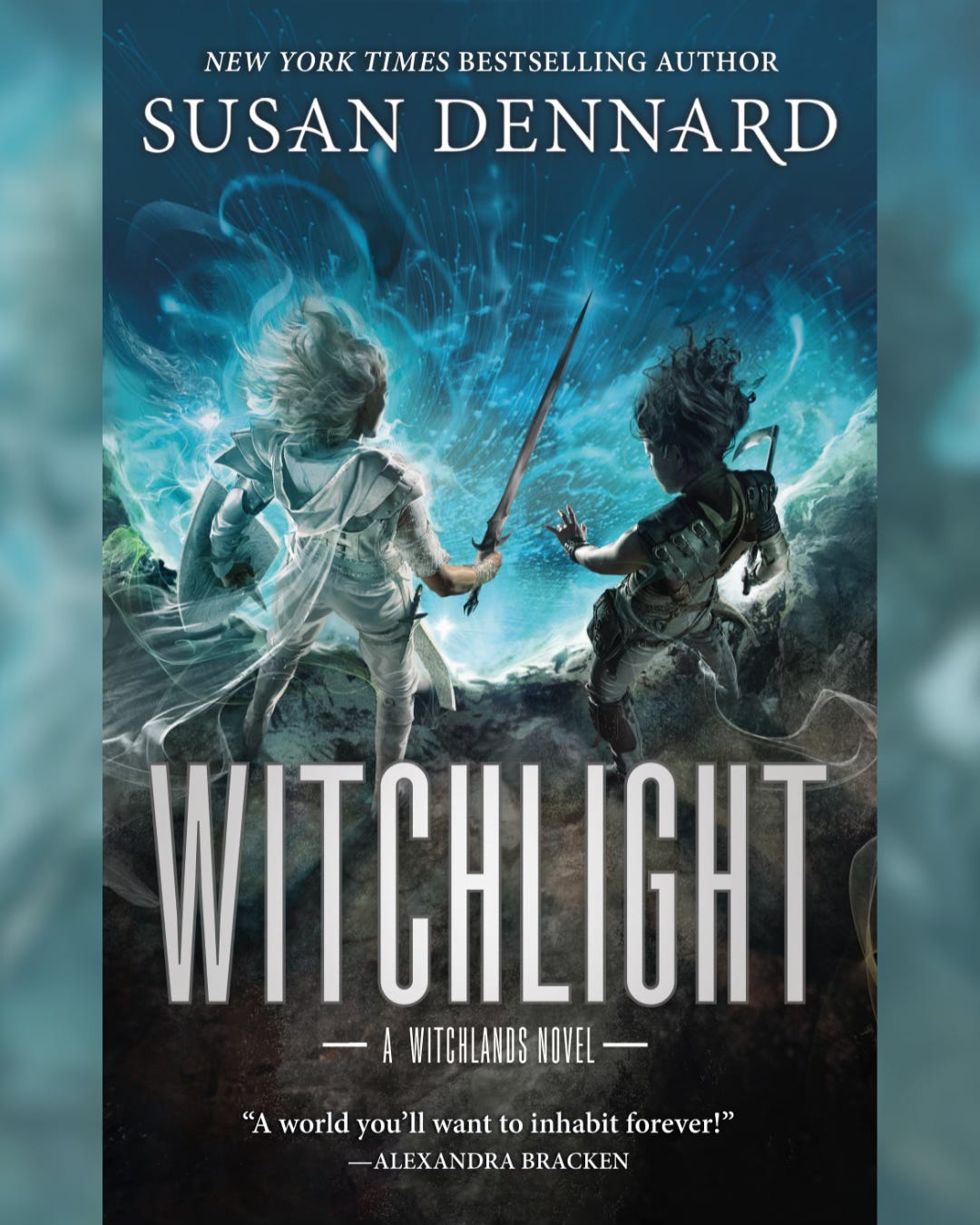 The book cover for Witchlight shows Safi in white on the left and Iseult in black on the right. The title reads Witchlight, with my name, Susan Dennard, also on the cover