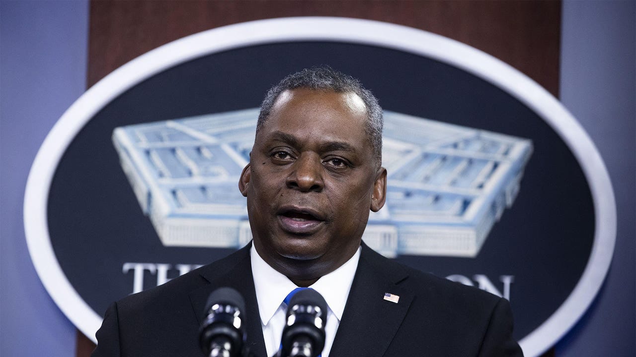  A photo of Lloyd Austin speaking at the Pentagon.
