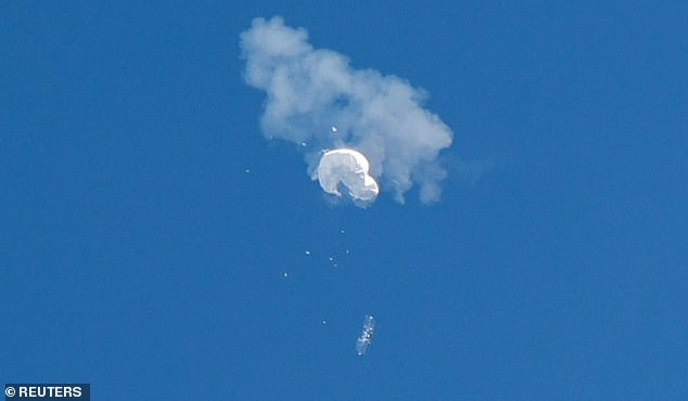 An anonymous source told the Washington Post a third balloon is likely operating near the US (pictured: the balloon shot down near South Carolina)