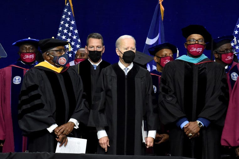 President Joe Biden, U.S. House Majority Whip Jim Clyburn, and Col. Alexander Conyers, president of South Carolina State University, arrive at commencement exercises for the HBCU.