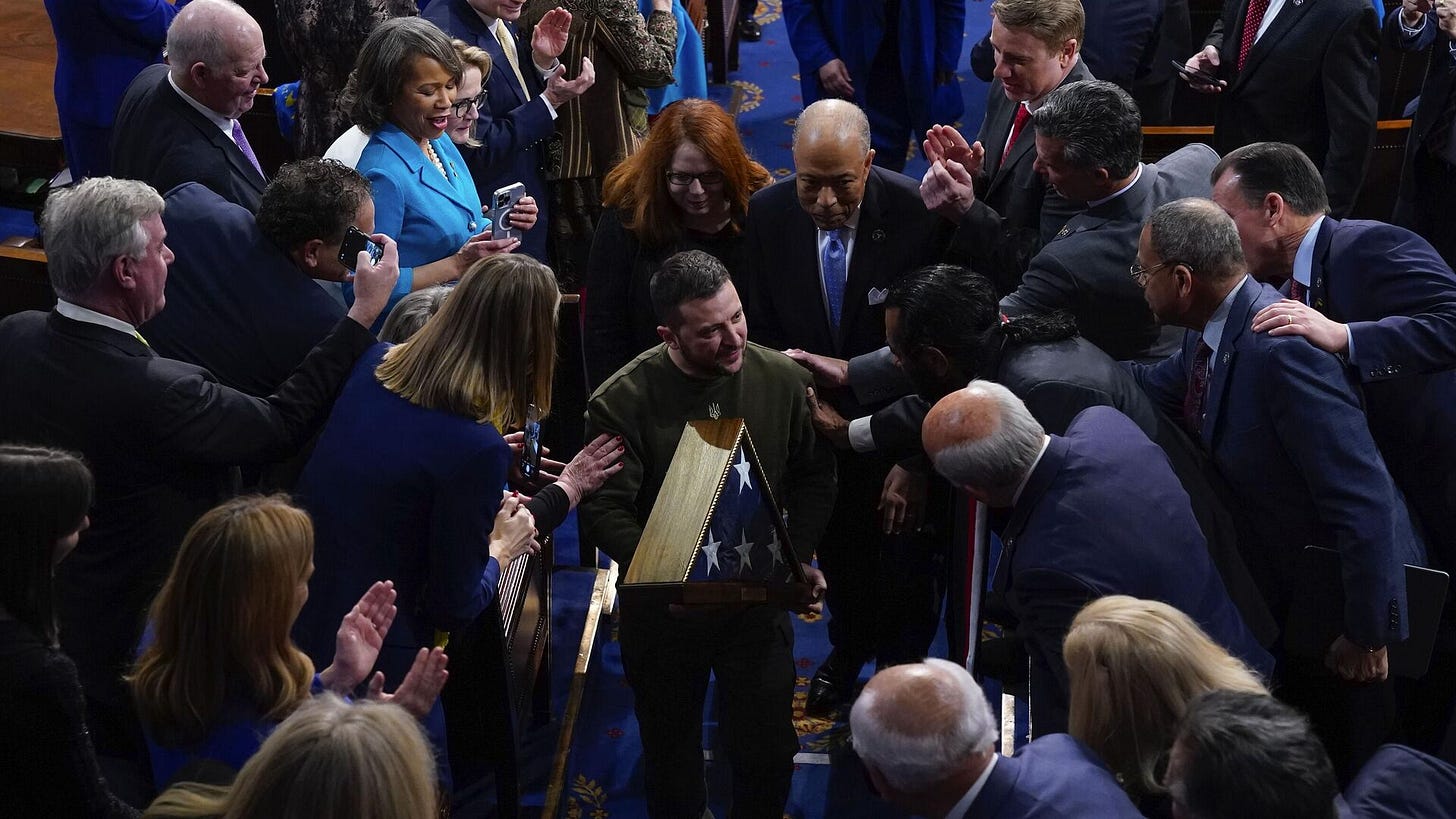 Ukrainian President Volodymyr Zelenskyy holds an American flag that was gifted to him by House Speaker Nancy Pelosi of Calif., as he leaves after addressing a joint meeting of Congress on Capitol Hill in Washington, Wednesday, Dec. 21, 2022. - Sputnik International, 1920, 21.01.2025