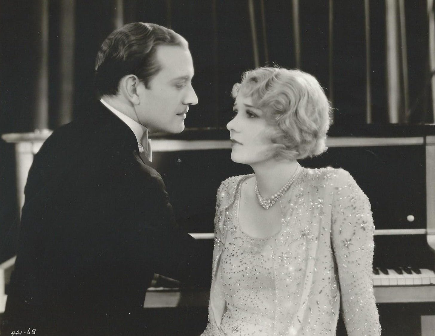 Conrad Nagel “singing” to Anita Page