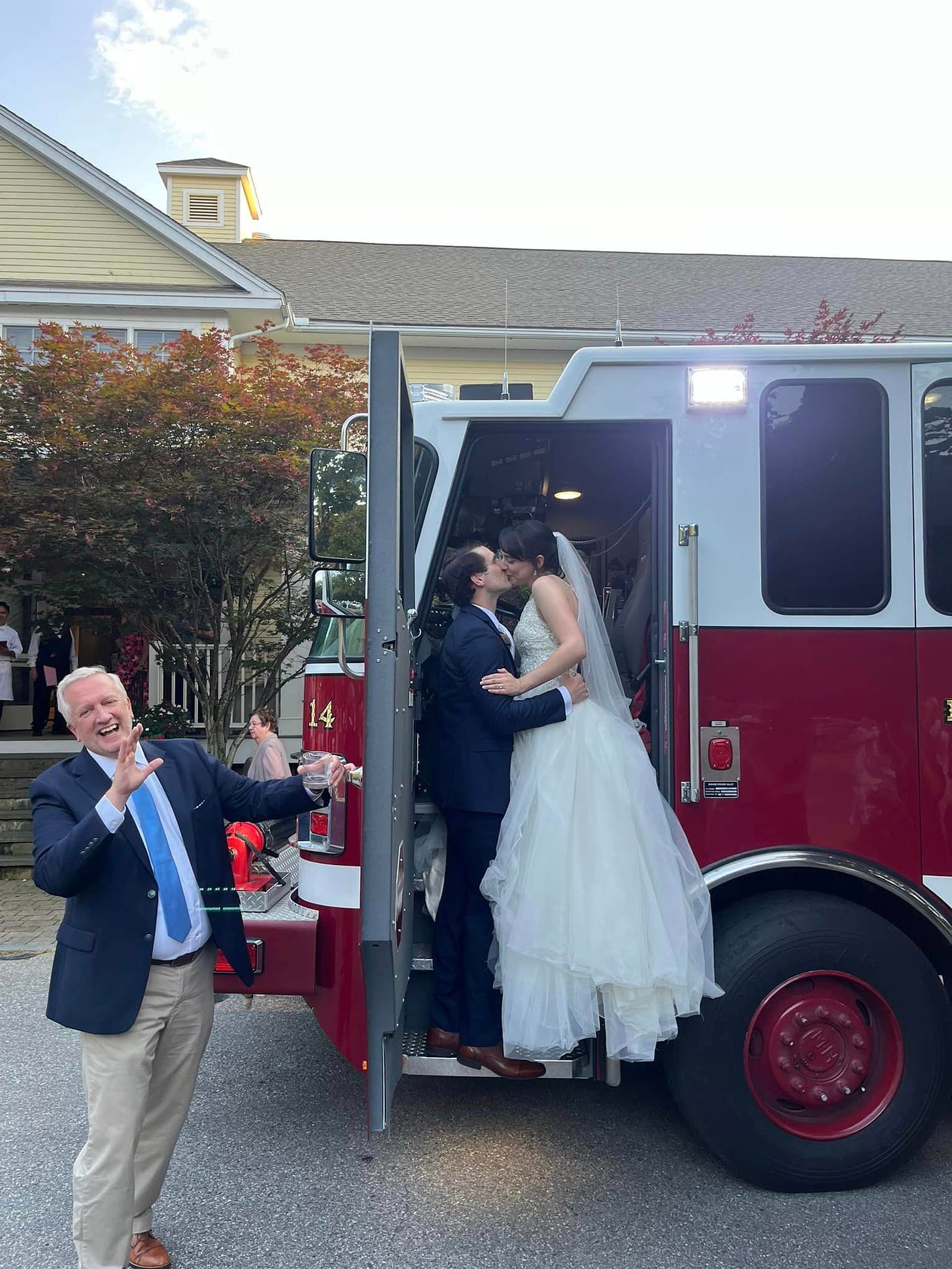 May be an image of 4 people, ambulance and wedding