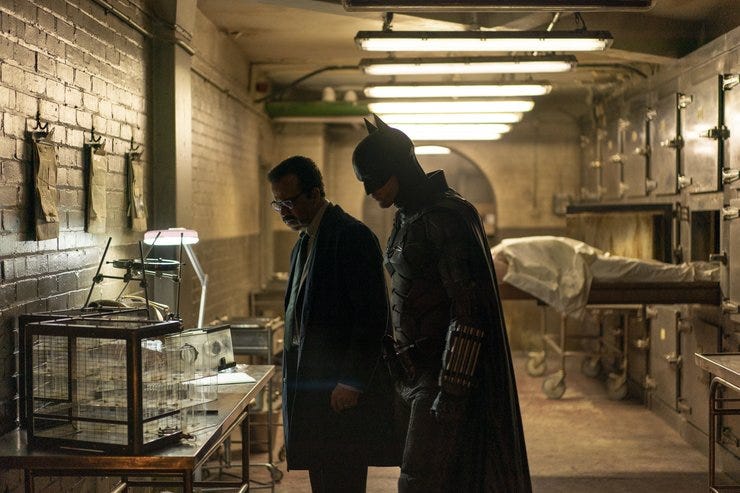 Batman and Jeffrey Wright's Jim Gordon doing some sleuthing and deducing
