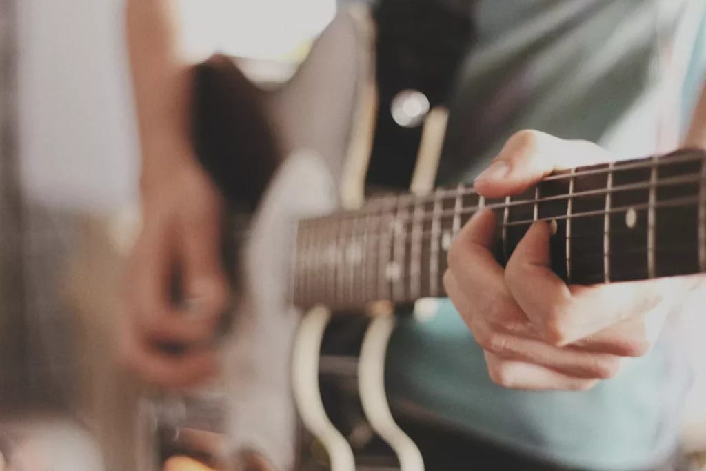 Man playing an electric guitar