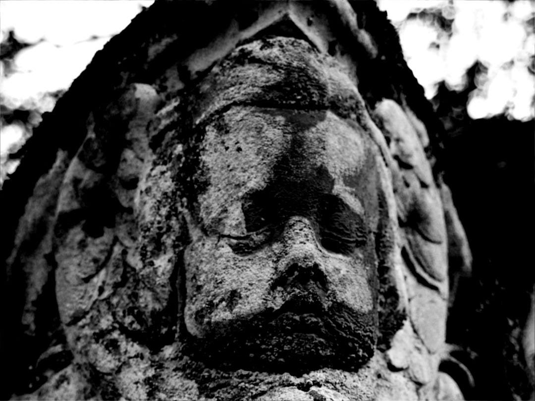 black concrete statue during daytime