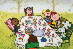 Charlie Brown and friends sit around the thanksgiving table
