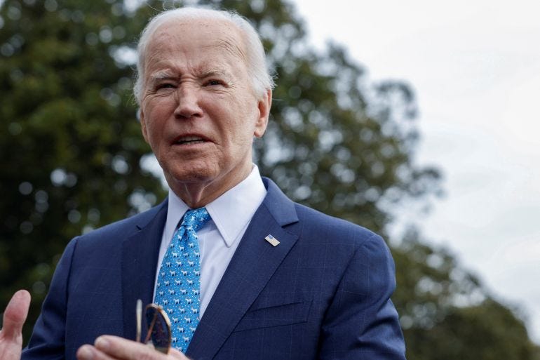 U.S. President Joe Biden looks on as he speaks to the media, before deparing the White House for Florida, in Washington