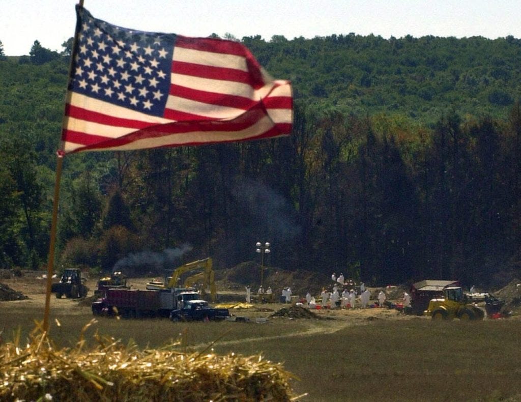 A makeshift altar, constructed for a worship service, overlooks the the crash site of United Airlines Flight 93, Sunday, Sept. 16, 2001, in Shanksville, Pa. The plane was hijacked and crashed during Tuesday's terrorist attacks. (AP Photo/Gene J. Puskar)