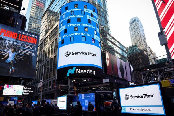 A screen displays the company logo for ServiceTitan, during the company's IPO at the Nasdaq Market in Times Square in New York City, U.S., December 12, 2024. REUTERS/Brendan McDermid