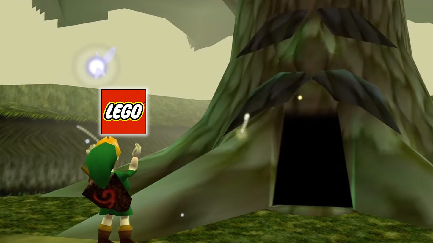 Link holding up the LEGO logo in front of the Great Deku Tree