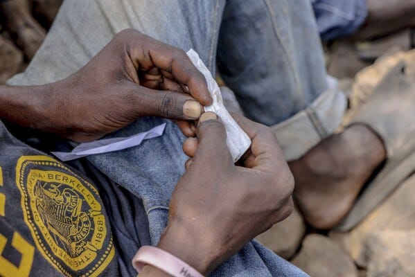 A boy rolls Kush at the Baghdad Den in Freetown, Sierra Leone, Tuesday, March 11, 2025. (AP Photo/Caitlin Kelly) A boy rolls Kush at the Baghdad Den in Freetown, Sierra Leone, Tuesday, March 11, 2025. (AP Photo/Caitlin Kelly)