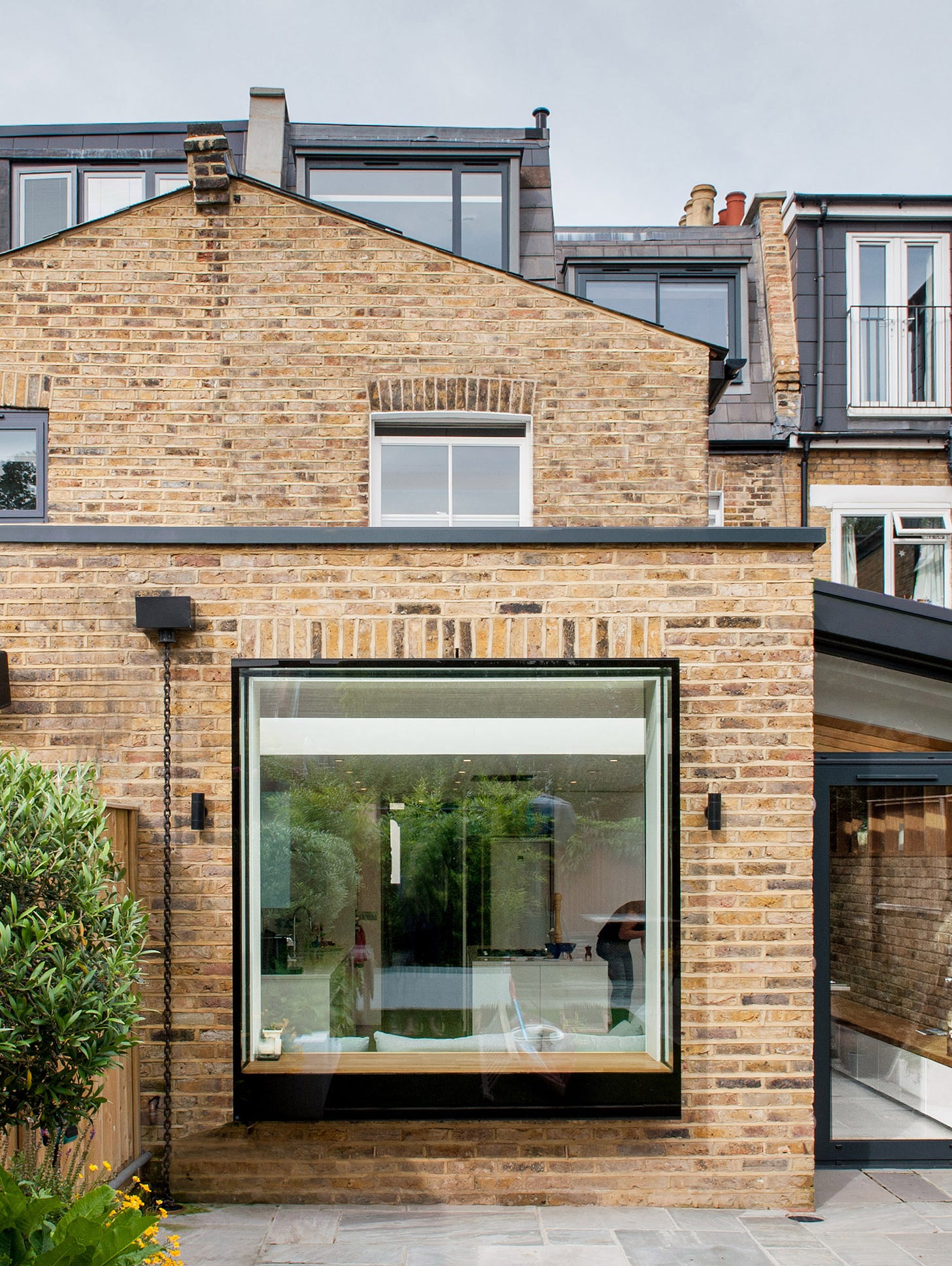 Studio 1 Architects adds brick extension and large window to London home