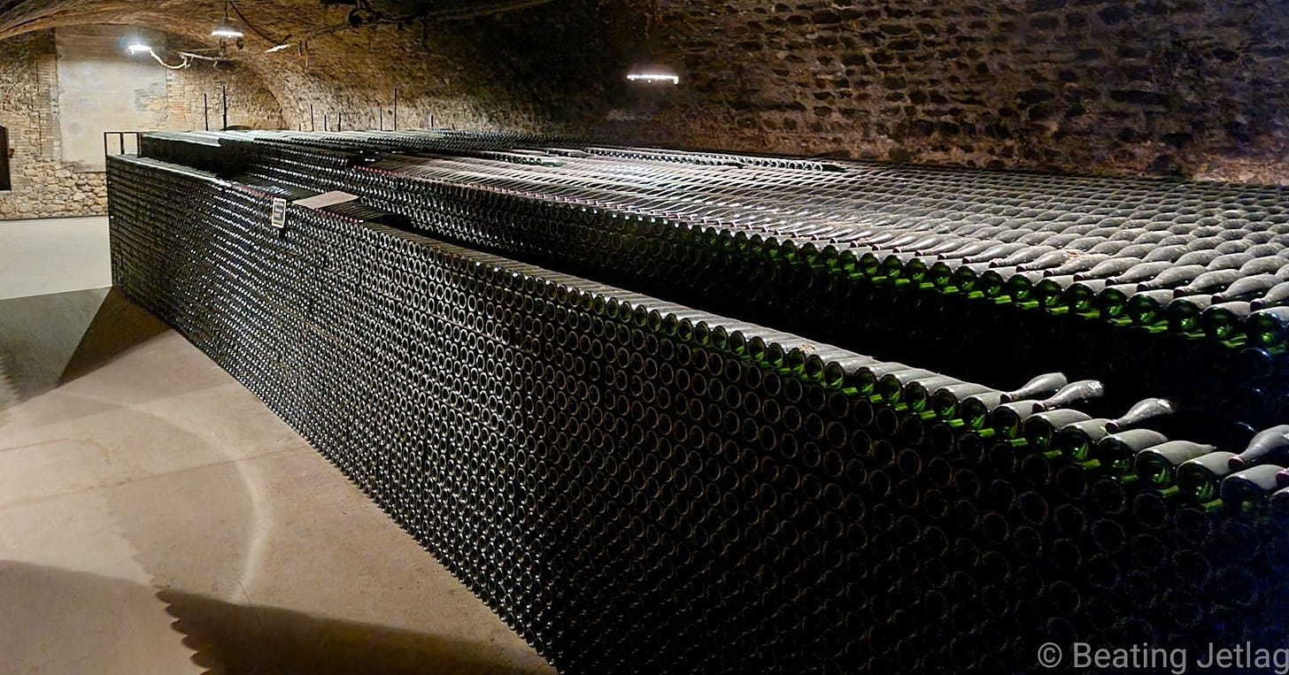 Large quantities of bottles of Champagne stored in a cellar in Champagne, France