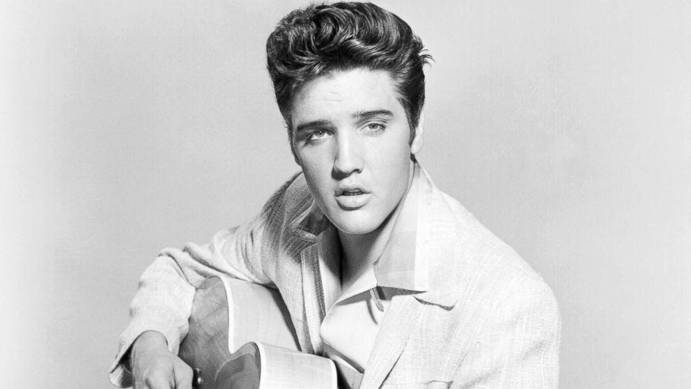 Black and white photo of Elvis Presley.