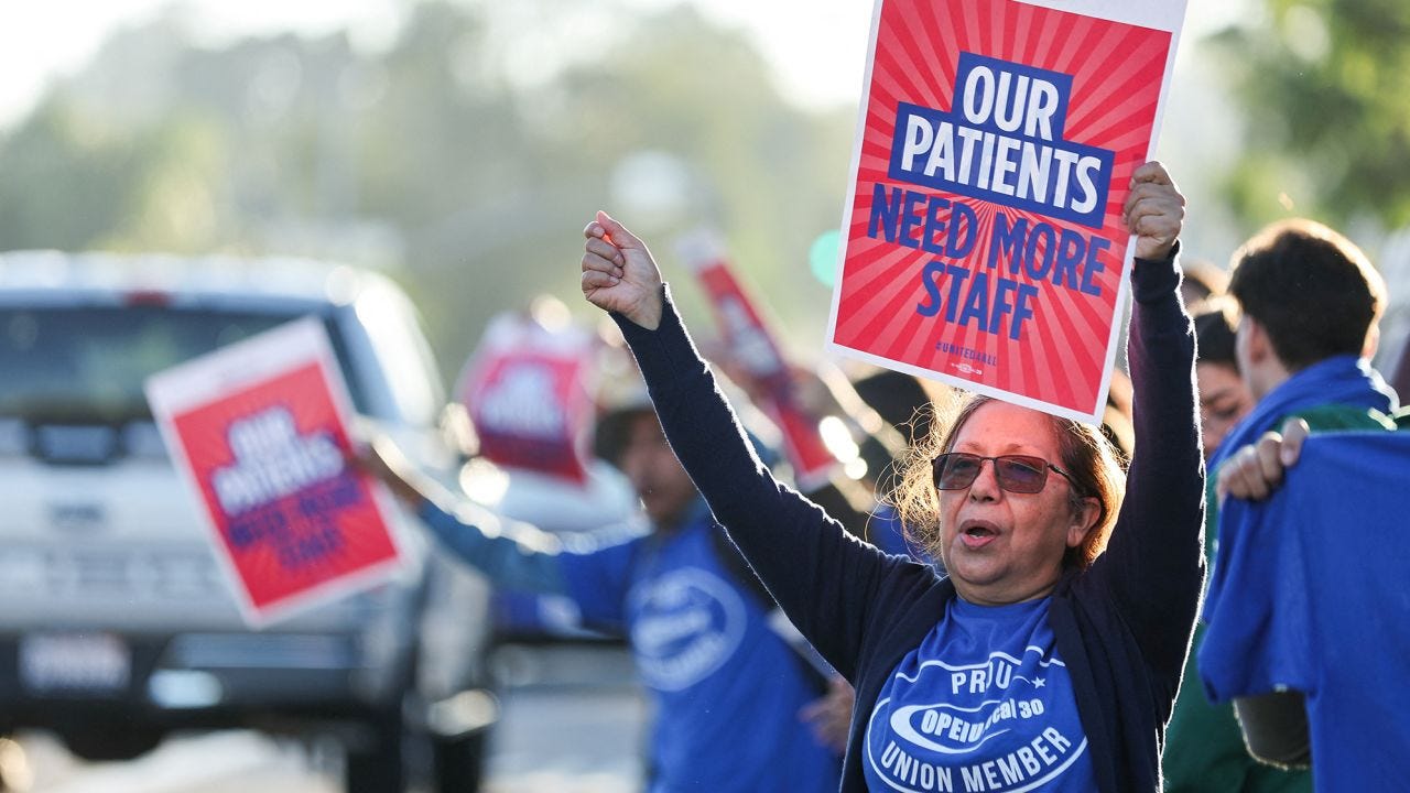 Kaiser Permanente workers walk off the job. It's the largest health care  worker strike in US history | CNN Business