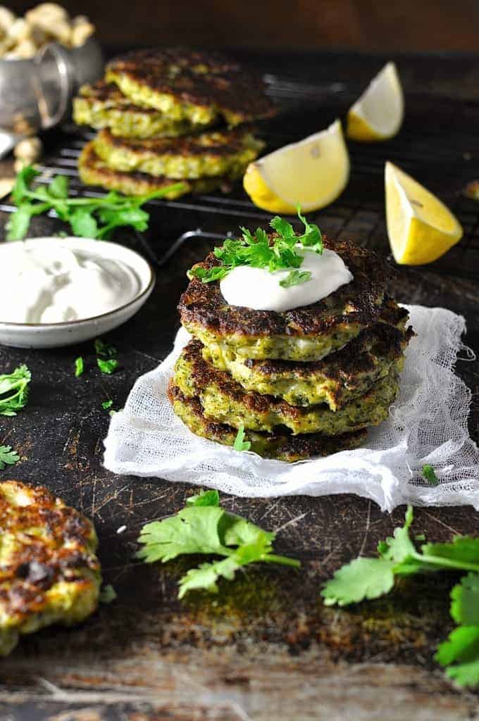 A stack of Broccoli Fritters with yoghurt sauce