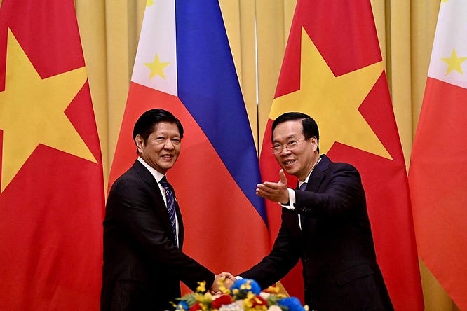 President of the Philippines (left) and Vietnam (right) shaking hands in Hanoi on January 30, 2024